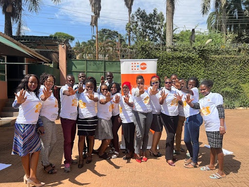 UNFPA Uganda staff in a group photo following an awareness session on the significance of 16 Days of Activism against Gender-Based Violence, which was facilitated by the Representative Ms. Gift Malunga.