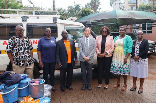 Japanese Ambassador to Uganda H.E. Sasayama Takuya (L), UNFPA Uganda Representative Ms Gift Malunga and oficials from ACORD Uganda, Madi-Okollo and Terego Districts at the handover ceremony at UNFPA offices in Kampala.. 