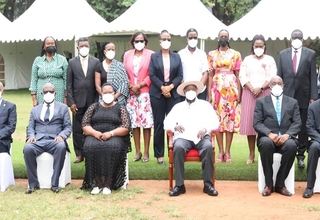 H. E President Yoweri Kaguta Museveni (seated, middle) in a photo with Cabinet ministers and UN Representatives. 