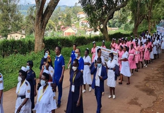Celebrating 100 Years of Progress: Midwives march through Kabale town, South Western Uganda, in commemoration of the Internation