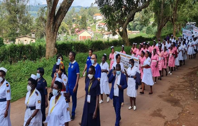 Celebrating 100 Years of Progress: Midwives march through Kabale town, South Western Uganda, in commemoration of the Internation