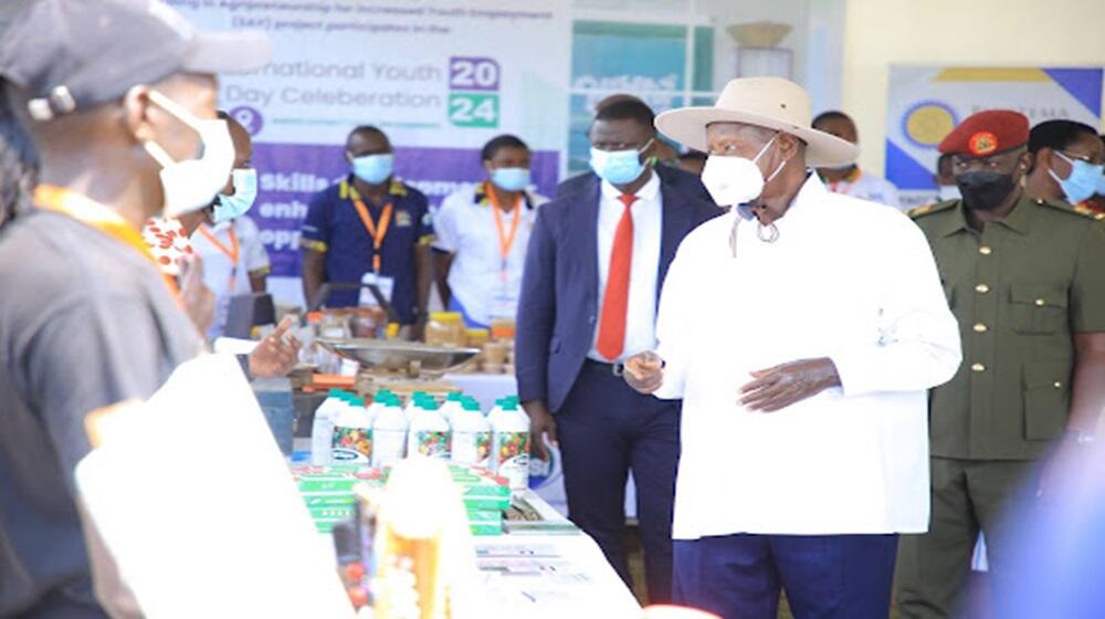 Uganda's President Yoweri Kaguta Museveni inspects the Innovators stall at the International Youth Day celebrations in Soroti City on August 12.