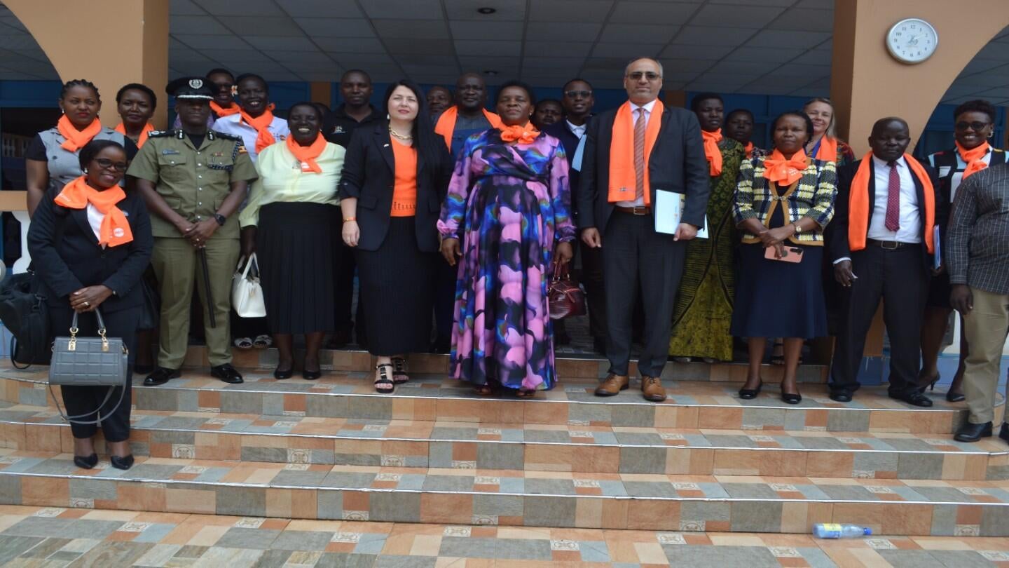 Minister of State (Gender) Hon. Peace Mutuzo (Centre) alongside Head of Mission, Austrian Development CorporationDr. Katja Yvonne Kerschbaumer (L) ,UNFPA Deputy Representative Mr. Daniel Alemu and stakeholders at the High Level Dialogue on Gender-Based Violence during the 16 Days of Activism against GBV. PHOTO: UNFPA/ Evelyn Matsamura Kiapi