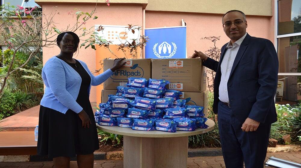 (L-R) UNFPA Uganda Deputy Representative Mr Daniel Alemu and Senior Protection Officer UNHCR Enid Ocheng during the handover.